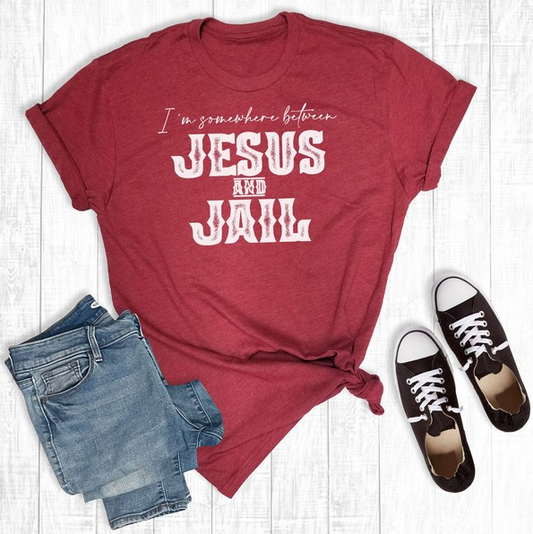 Between Jesus and Jail Graphic Tee
